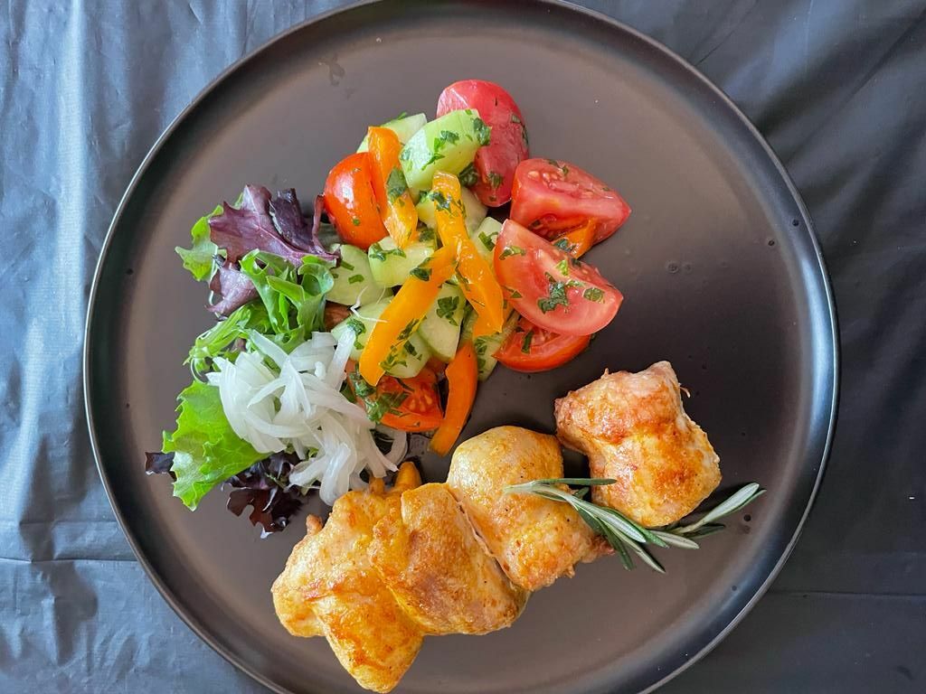 Fried vegetable salad<br>with chicken shish kebab